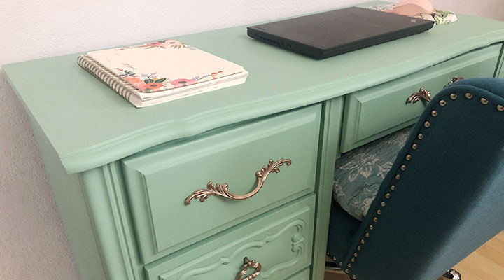 painted desk with blue chair and laptop 